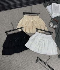 Chân váy tầng  nơ trắng