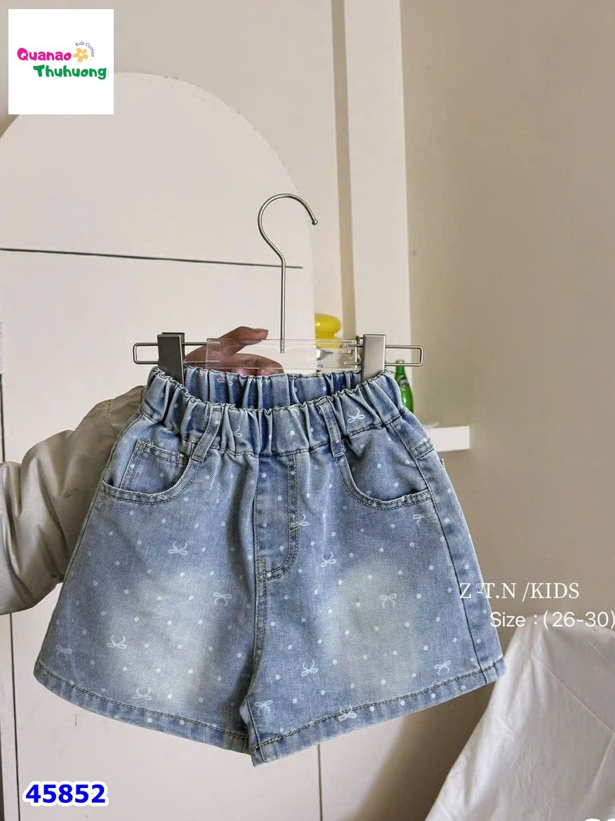 Quần short jean xanh chấm bi nơ