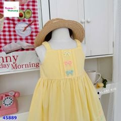 Đầm 2 dây Azuri vàng đính nơ