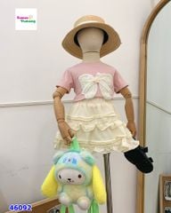 Set áo kem đính nơ, chân váy hồng