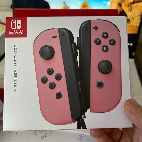 Tay cầm Joy con hồng pastel
