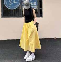 Set chân váy vàng và áo thun