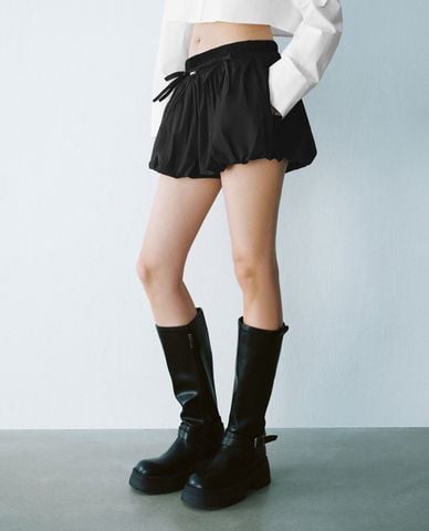  URBAN REVIVO - Quần short nữ giả váy phối nơ nữ tính 