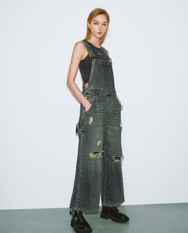  URBAN REVIVO - Jumpsuits nữ ống loe rách vải cá tính 