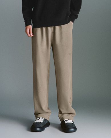  URBAN REVIVO - Quần nam ống rộng lưng thun rút dây Straight 