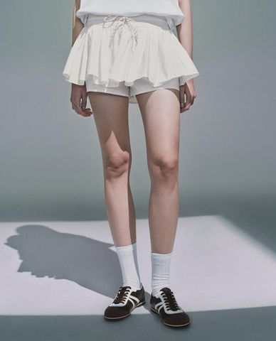  URBAN REVIVO - Quần short giả váy nữ phối dây rút 