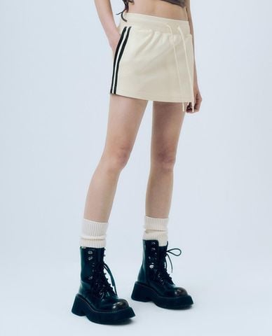  URBAN REVIVO - Chân váy chữ A mini phối dây rút 