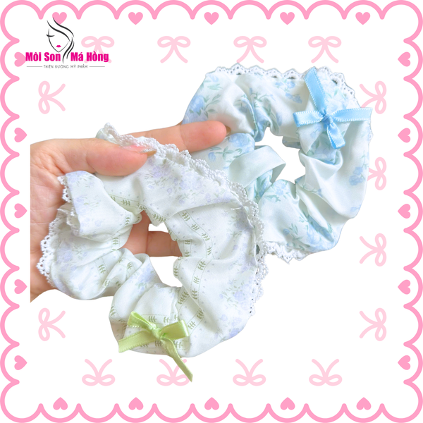 Cột tóc viền ren trắng nơ xanh
