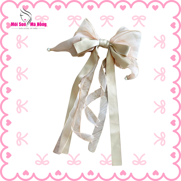 Kẹp tóc nơ tua rua dài đính hạt trai