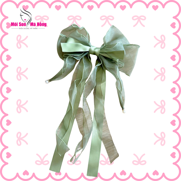 Kẹp tóc nơ tua rua dài đính hạt trai