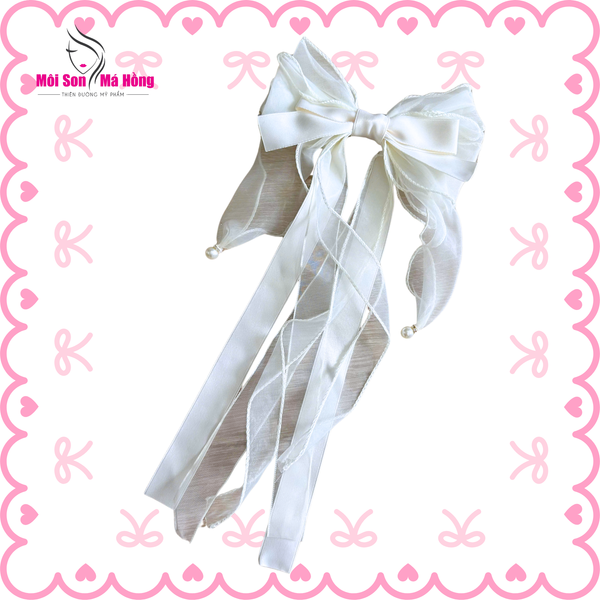 Kẹp tóc nơ tua rua dài đính hạt trai