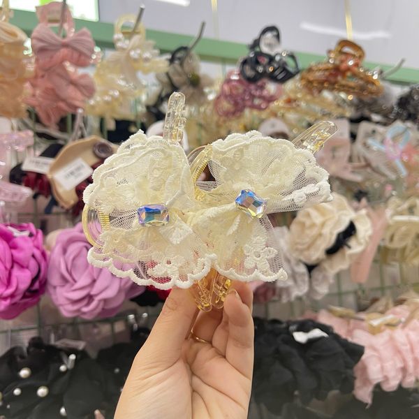 Kẹp cào ren nơ đính đá