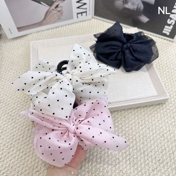 Kẹp cào nơ chấm bi