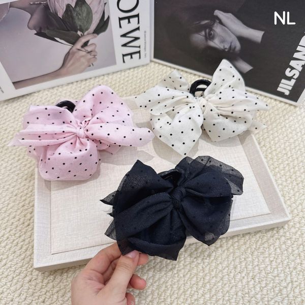 Kẹp cào nơ chấm bi