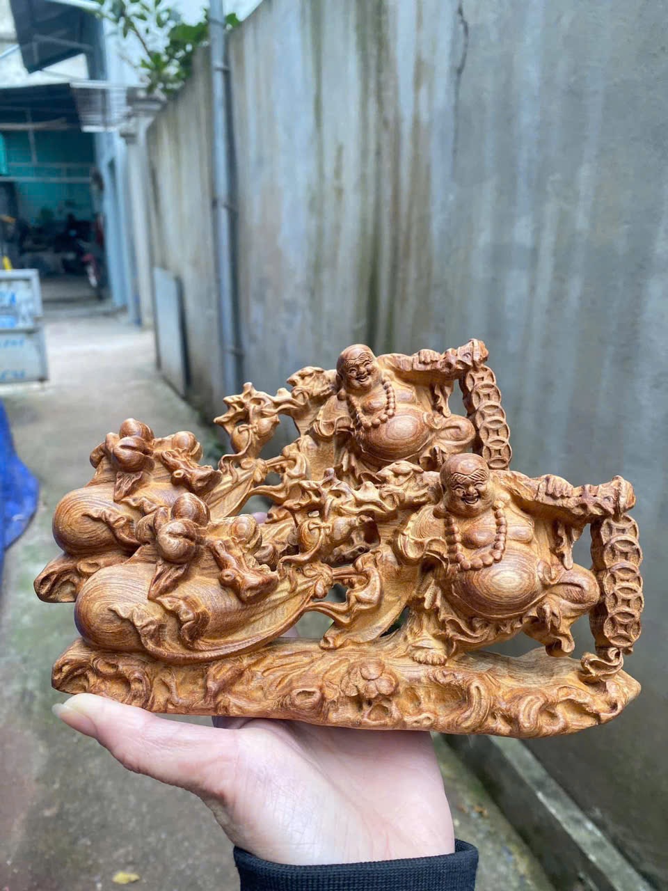 Tượng Di Lặc Kéo Bao Gỗ Ngọc Am – Phong Thủy Tài Lộc