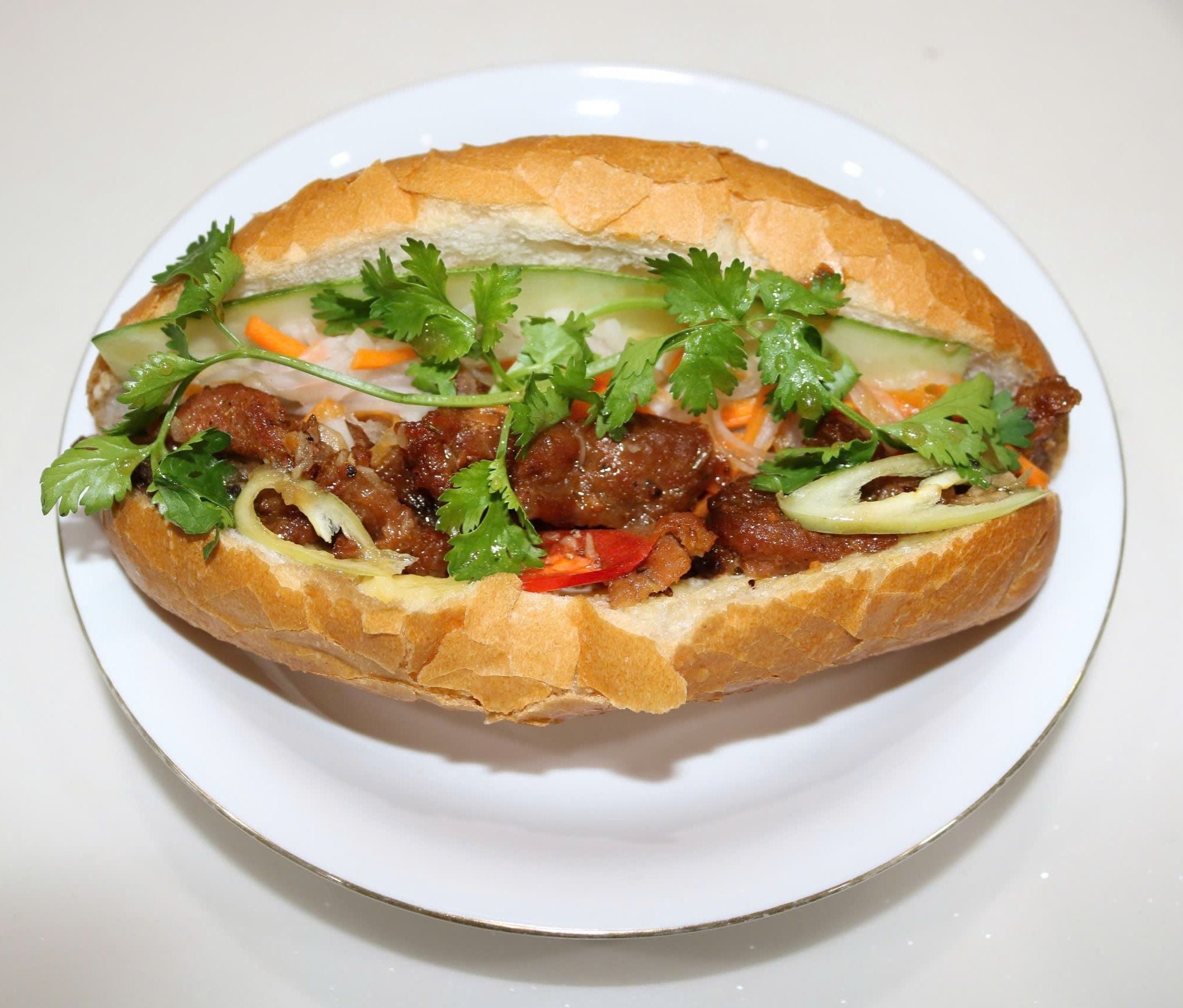  Bánh mì thịt nướng  + Ốp la 01 trứng 