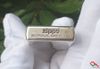 Zippo bạc khắc hình cá chép ZN172