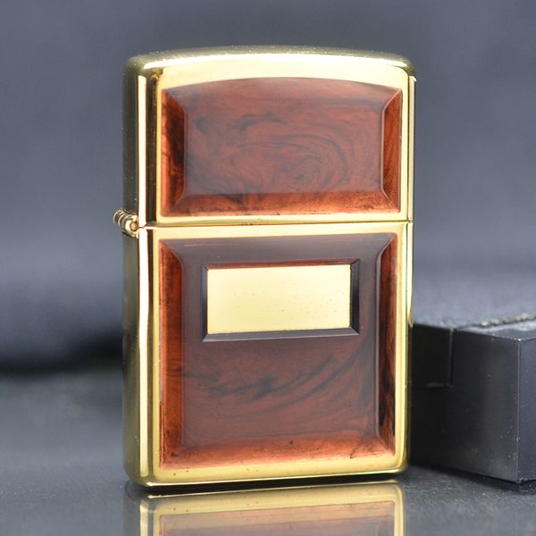 Zippo 1997 mạ vàng ốp emblem hổ phách C740