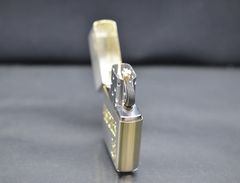 Zippo 1991 chữ dập mạ vàng mộc đáy chéo C139