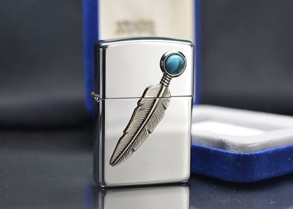 Zippo 1997 emblem lông chim C383