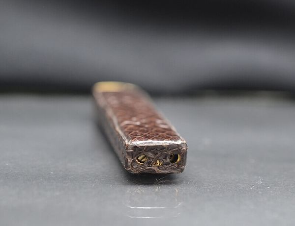 Set Zippo 4 thứ bọc da rắn 1995 C11