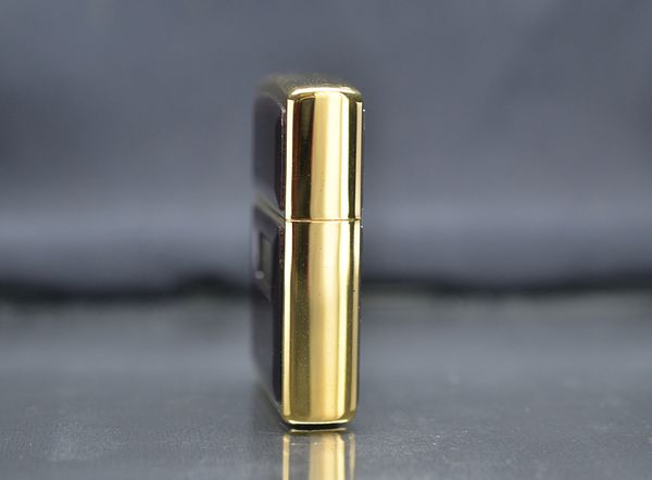 Zippo 1997 mạ vàng ốp emblem hổ phách C740