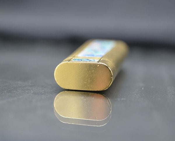 Cartier ốp đá Opal hiếm CA11