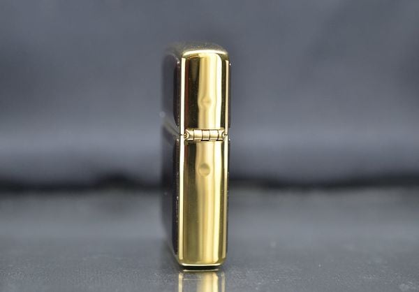 Zippo 1997 mạ vàng ốp emblem hổ phách C740