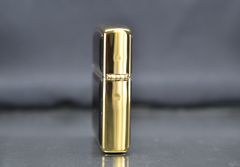 Zippo 1997 mạ vàng ốp emblem hổ phách C740