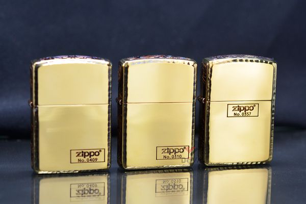 Zippo Armor viền gõ búa cạnh hoa văn đồng cháy bản giới hạn ZN325