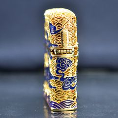 Zippo Mỹ xuất Nhật bọc vàng ốp Trâu Chiến dạ quang ZN340