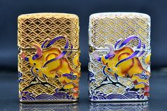 Zippo Mỹ xuất Nhật bọc vàng ốp Trâu Chiến dạ quang ZN340