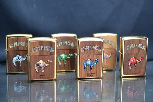 Zippo xuất Nhật ốp gỗ óc chó khảm trai Chủ Đề Camel ZN346