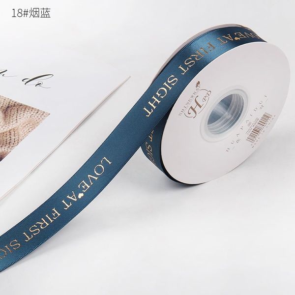 Ruy băng lụa -- Ruy Băng in chữ nổi --. khổ rộng 2,5CM loại đẹp.