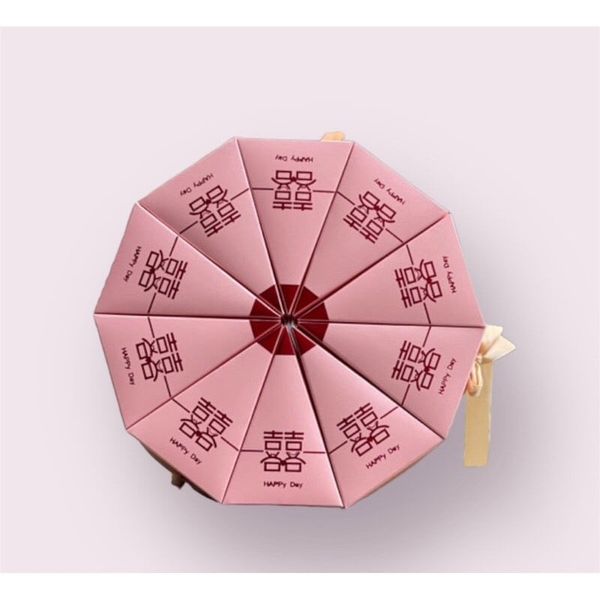 Vỏ hộp tam giác hồng ánh nhũ xếp tròn - Vỏ hộp bánh cưới sang trọng