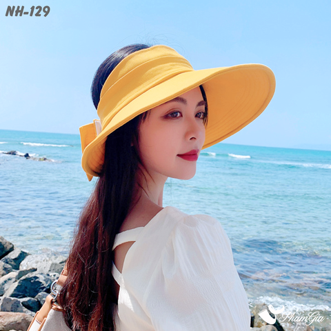 Người Mẫu Đội Nón Vải Mui Trần Kết Nơ To Bản Màu Vàng Nghệ