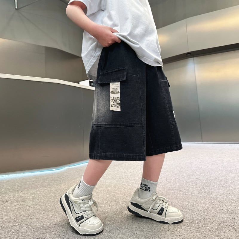 Quần bò ngắn đính tag Q21