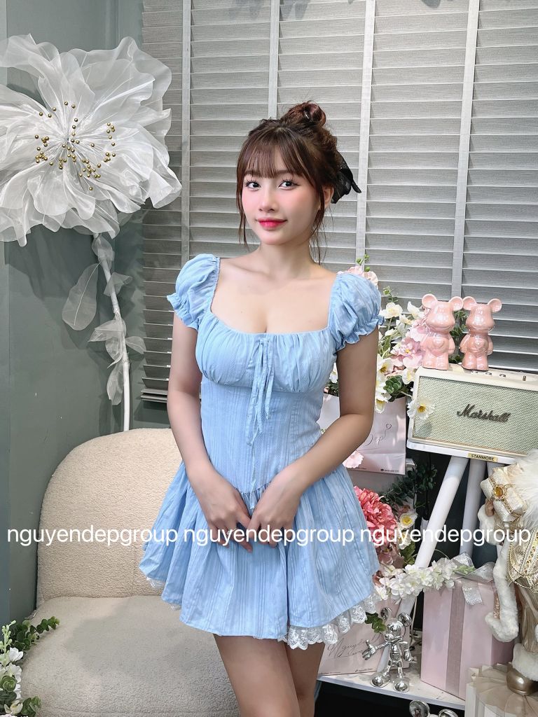 Đầm xòe nhún ngực tay phồng cột nơ