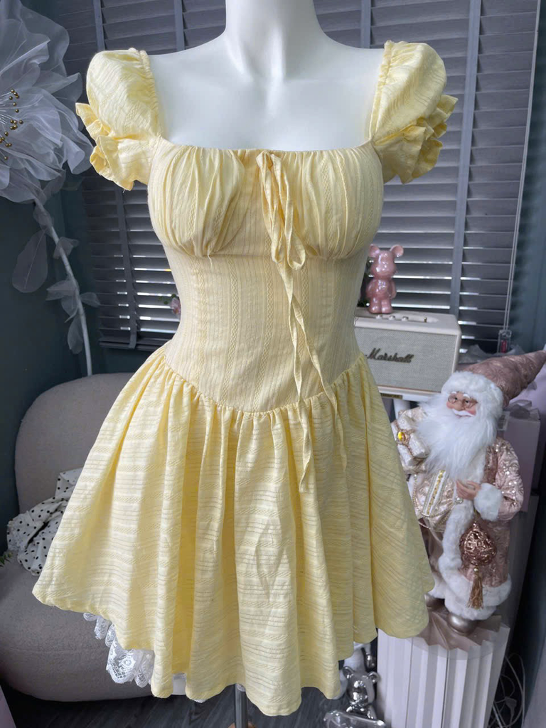 Đầm xòe nhún ngực tay phồng cột nơ