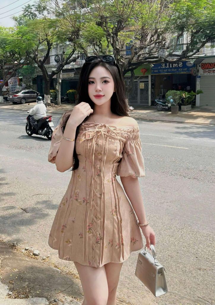 Đầm trễ vai nhún tay bồng phối nơ